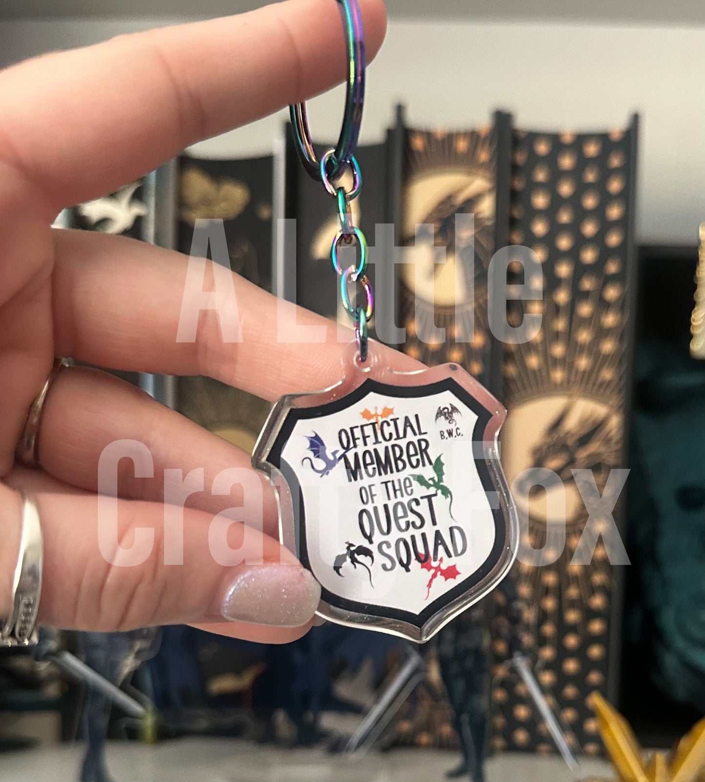 Member of the Quest Squad Onyx Storm Inspired Officially Licensed Glitter Acrylic Keychain