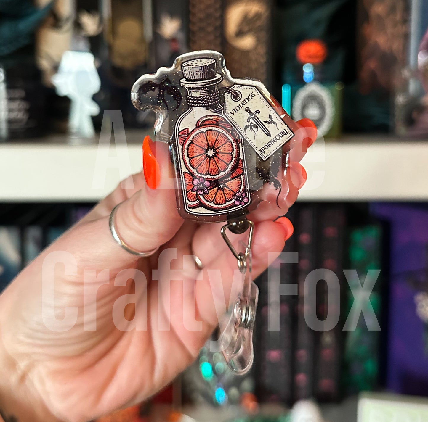 Violet’s Apothecary Fourth Wing Inspired Officially Licensed Glitter Acrylic Badge Reel