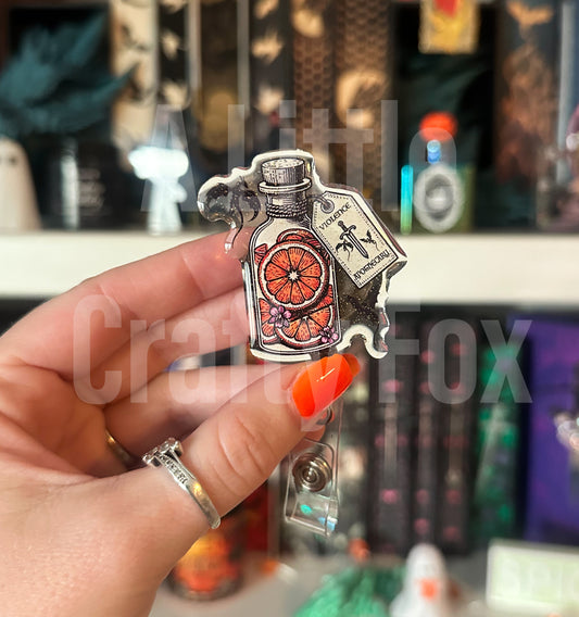 Violet’s Apothecary Fourth Wing Inspired Officially Licensed Glitter Acrylic Badge Reel