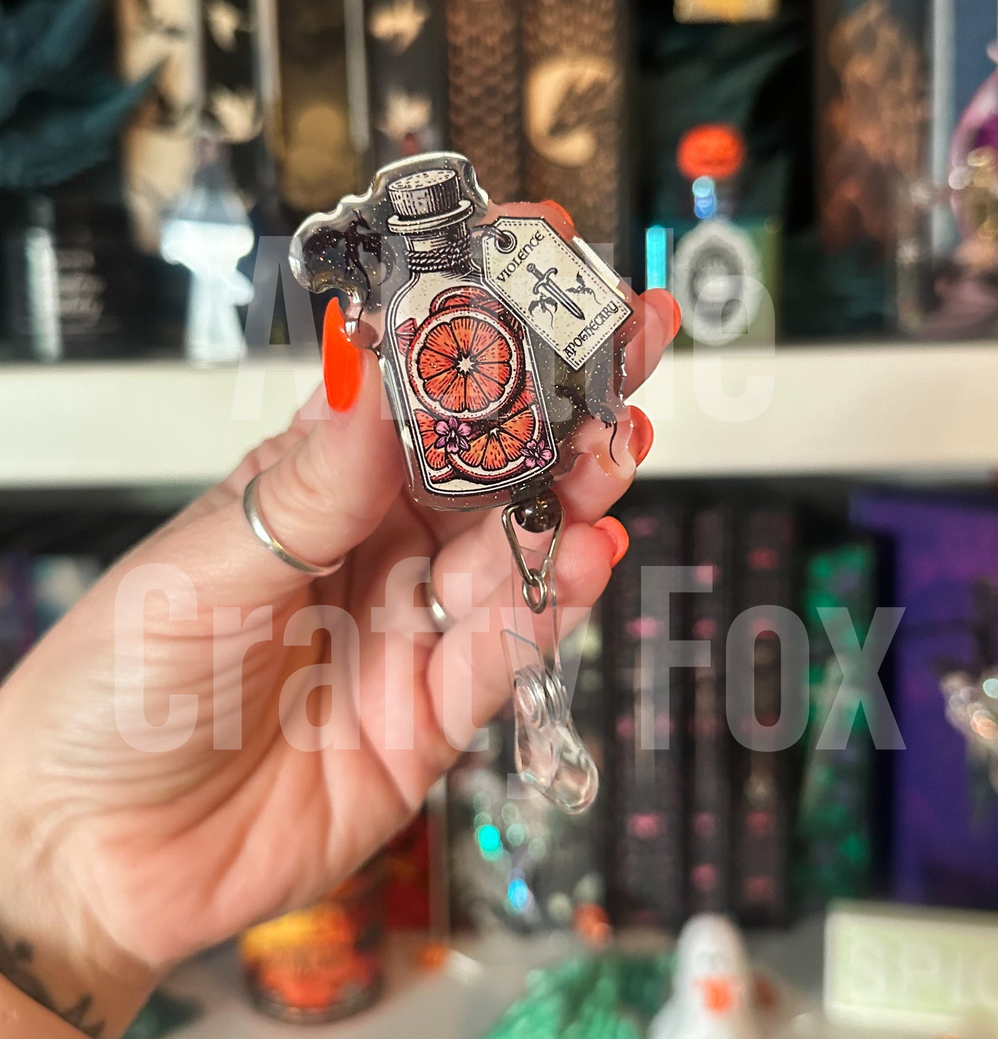 Violet’s Apothecary Fourth Wing Inspired Officially Licensed Glitter Acrylic Badge Reel